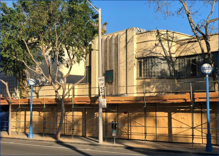 Dog and Cat Hospital bboarded up ready for demolition